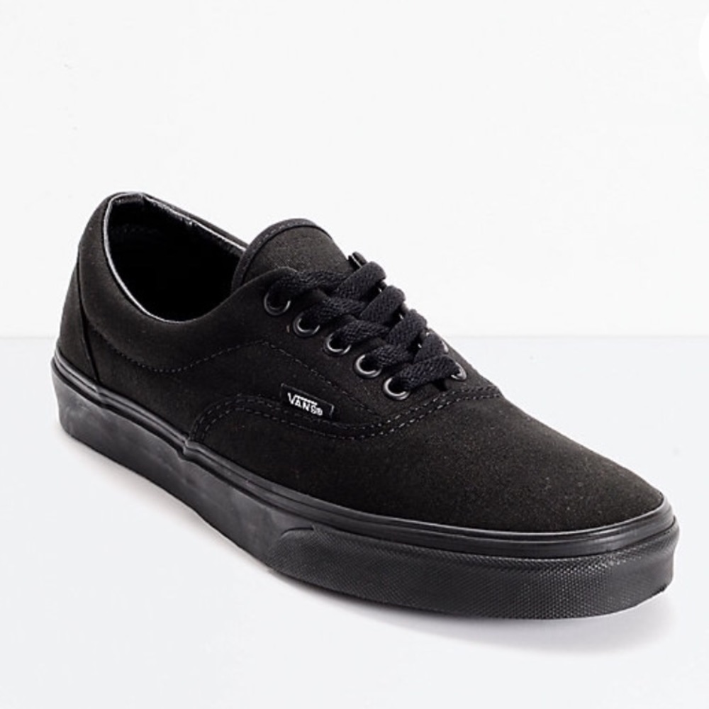 Black low top Vans